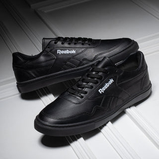Reebok Men’s Leather Flat Sneakers
